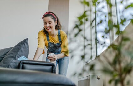 Cleaning Your Couch: woman cleaning